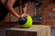 V-ups work with your upper and lower abs. (Image via Pexels/ Karen Irala)